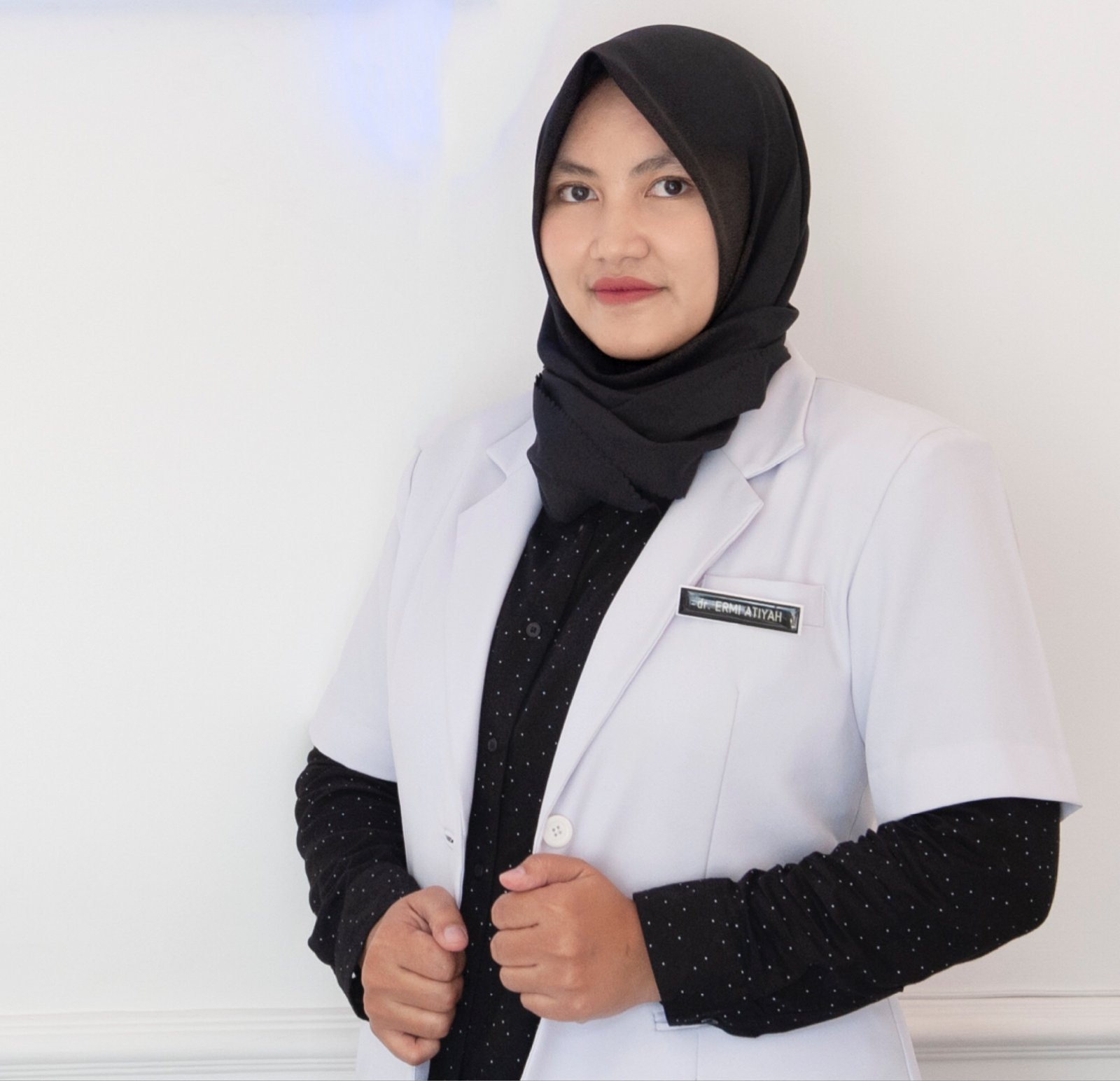 dr. Ermi Atiyah
